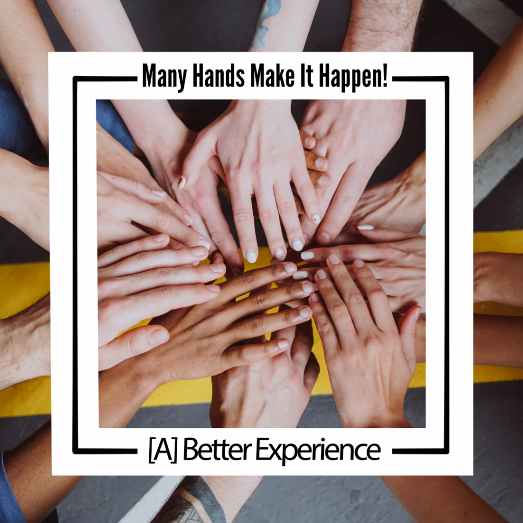 Graphic of many hands coming together in a circle with a white square box around them that says ‘Many Hand Make It Happen!’ at the top and ‘[A] Better Experience’ at the bottom.