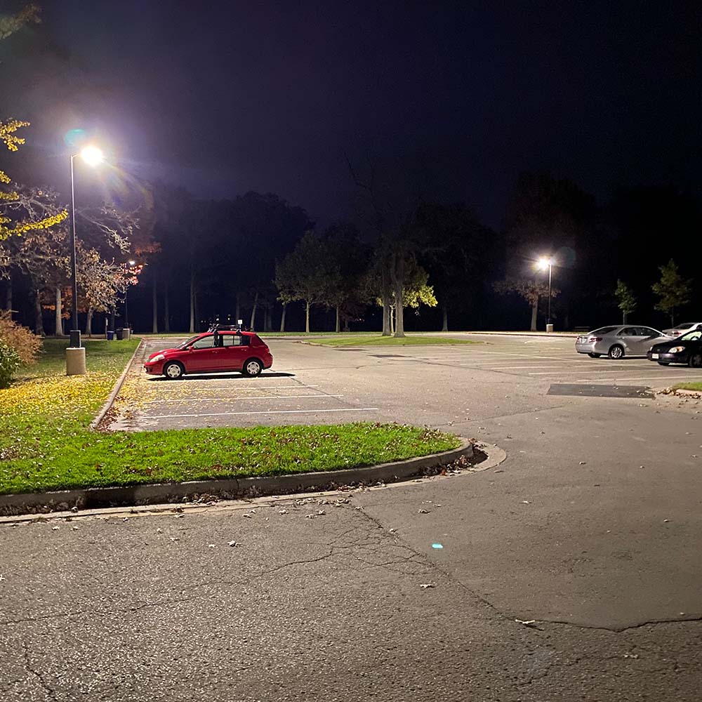 Brightly lit parking lot at night