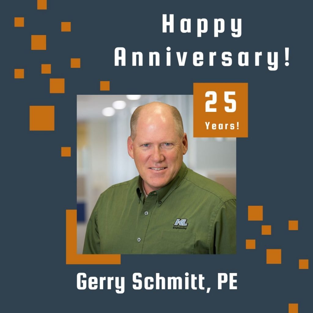 Photo of Gerry Schmitt framed by a navy background with orange scattered boxes and Happy Anniversary text.