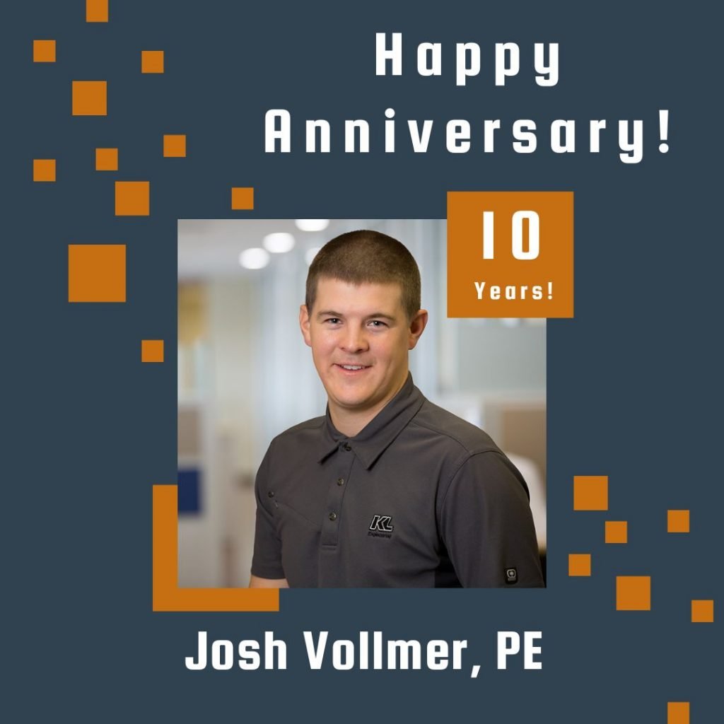 Photo of Josh Vollmer framed by a navy background with orange scattered boxes and Happy Anniversary text.