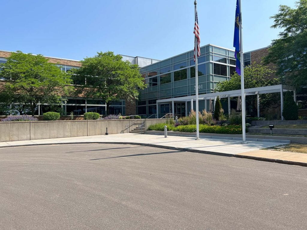 WSLH-DFD project showing building and new pavement in front.