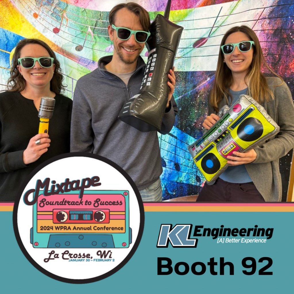 Playful selfie photo of 3 KL employees wearing sunglasses with inflatable microphone, boom box, and old school cell phone - with Conference mixtape logo and Booth 92 with KL logo at bottom.