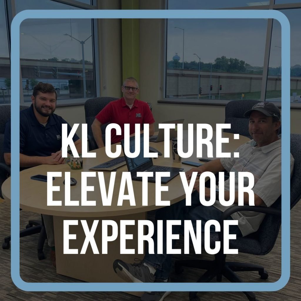 Graphic showing a faded photo of 3 KL employees working together at a computer with 'KL Culture: Elevate Your Experience' text in white.