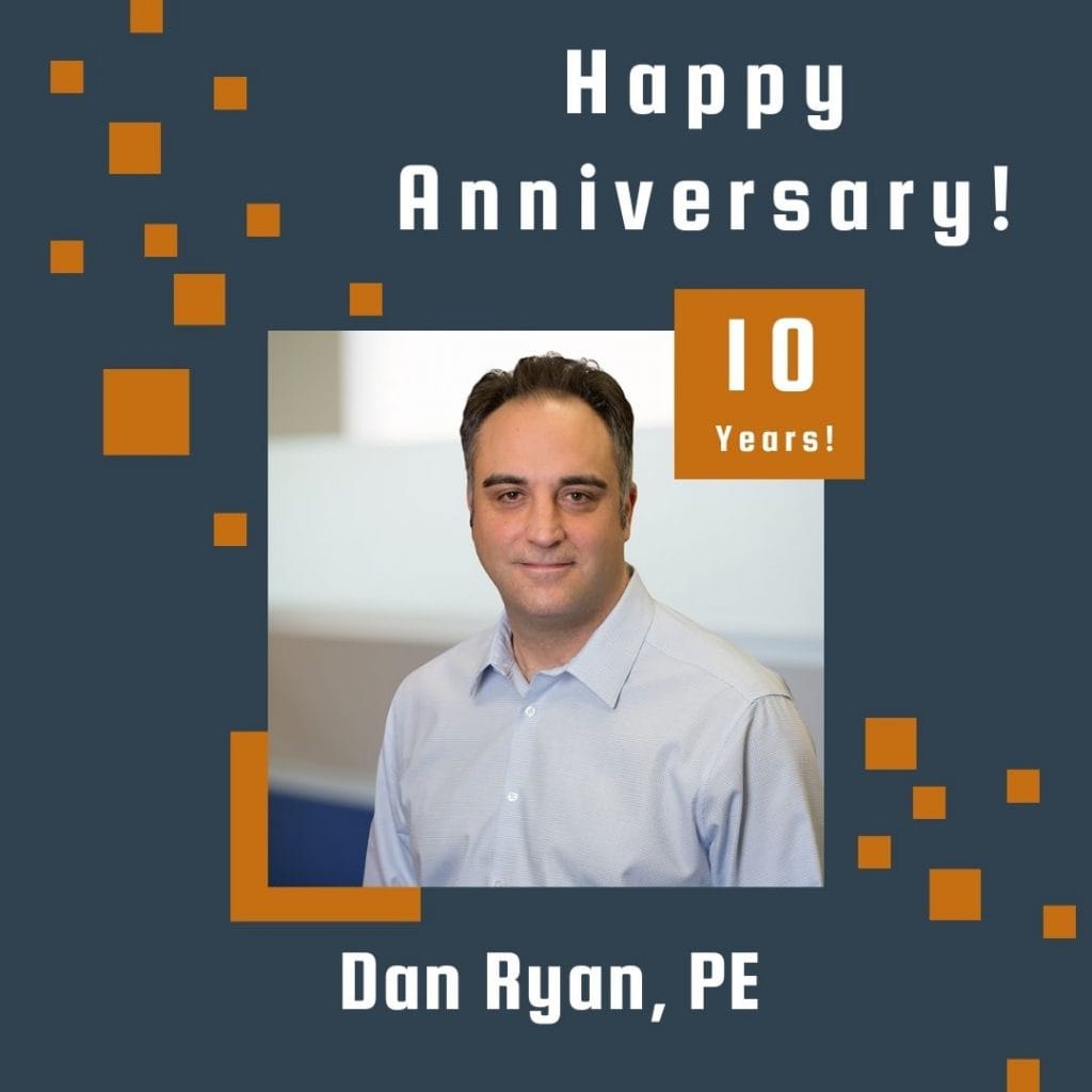 Photo of employee framed by a navy background with orange scattered boxes and Happy Anniversary text.