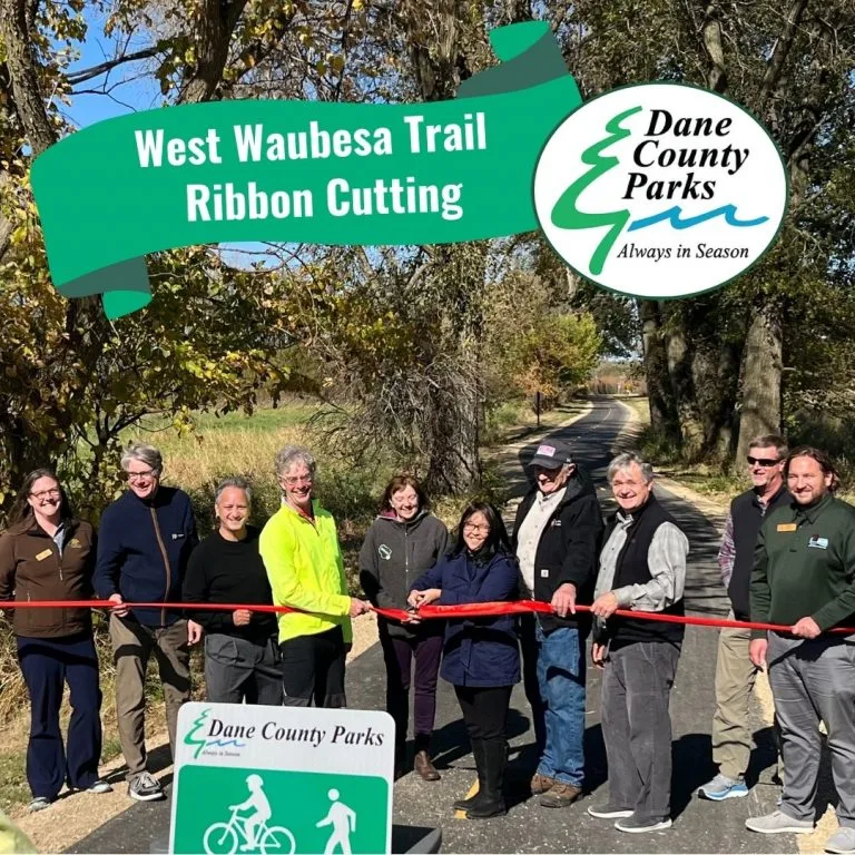 Photo from the event showing the ribbon cutting.