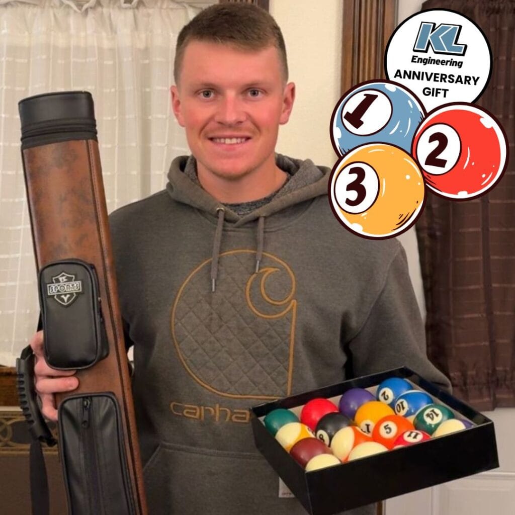 Photo of Kevin Konyn with this billiards stick and new ball set.