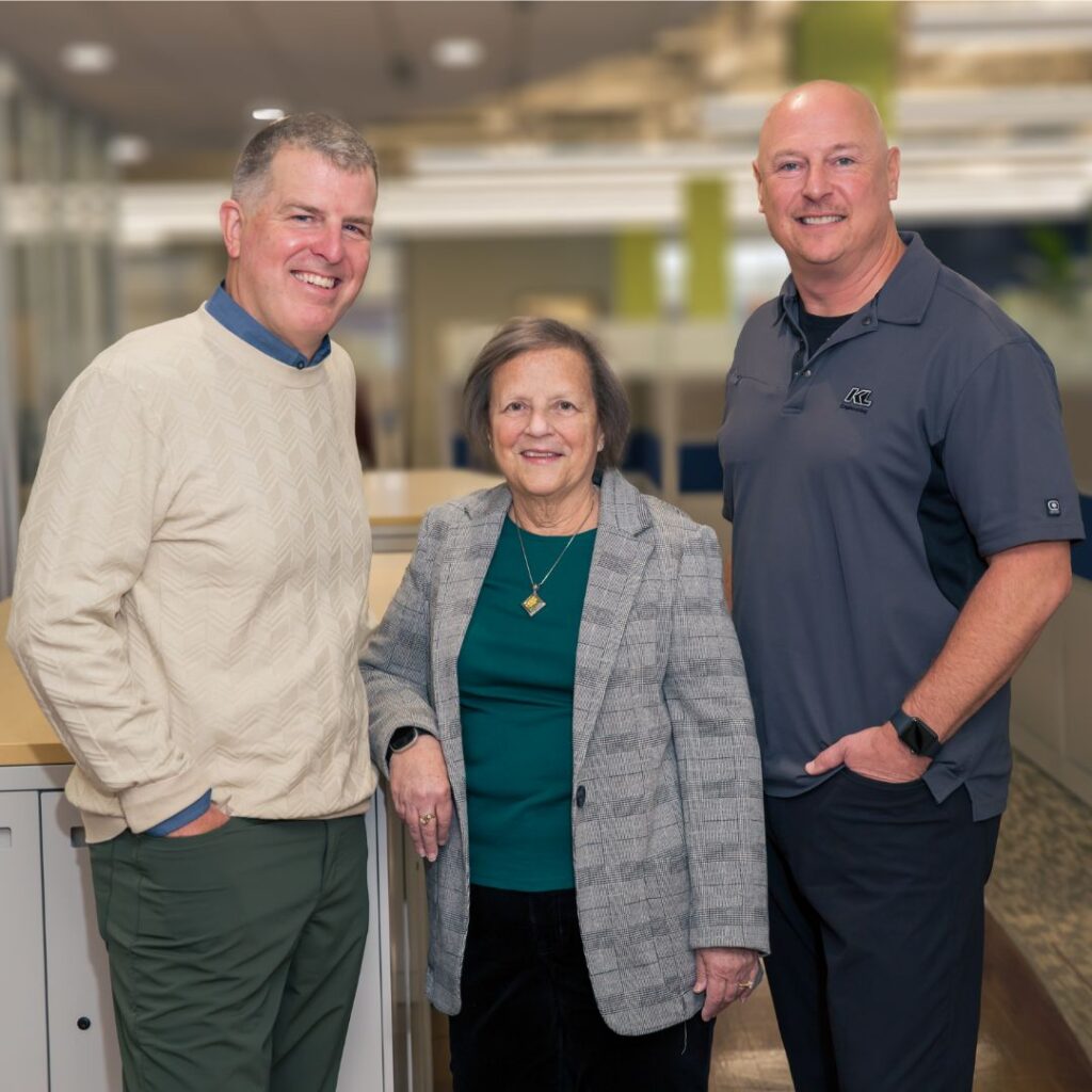 Photo of Scott Cramer, Kim Lobdell, and Ryan Schanhofer posed in the KL Engineering HQ.