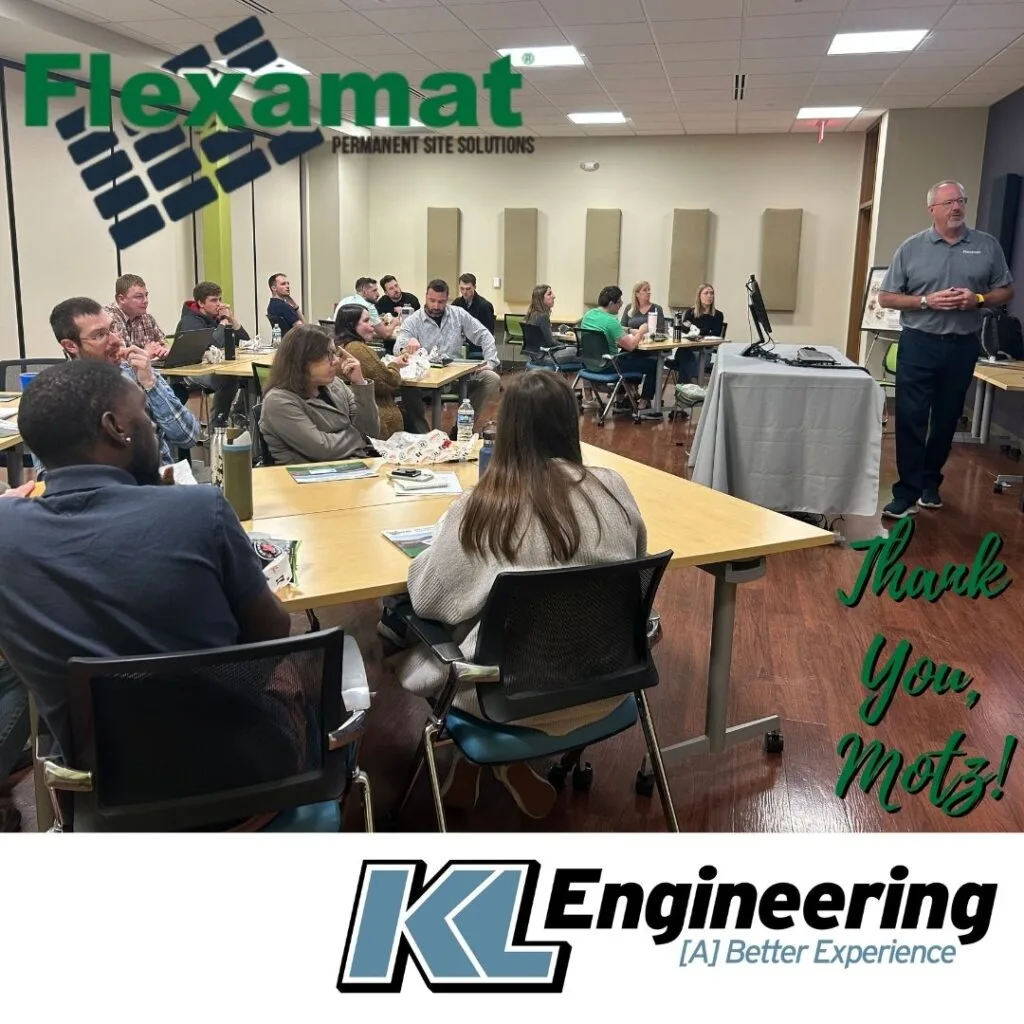 Photo of Ron presenting to staff at KL with Flexmat and KL logos and 'Thank you, Motz!'