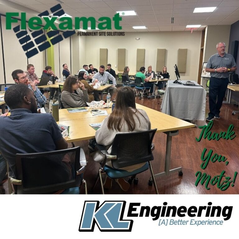 Photo of Ron presenting to staff at KL with Flexmat and KL logos and 'Thank you, Motz!'
