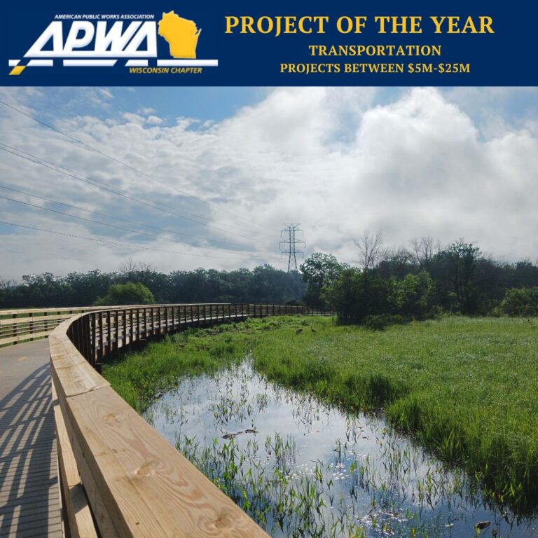 Graphic includes the logo for "APWA Wisconsin Chapter," as well as "Project of the year Transportation, Projects between $5M-25M Dollars" and a photo of LYRT's bridge over wetlands.