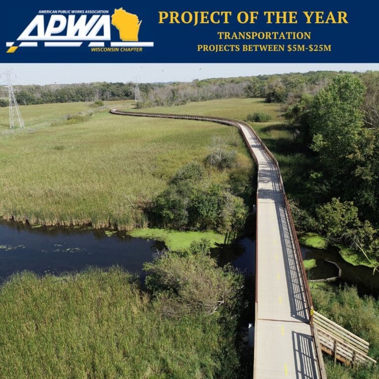 Graphic includes the logo for "APWA Wisconsin Chapter," as well as "Project of the year Transportation, Projects between $5M-25M Dollars" and a photo of the parking area of LYRT and Fish Camp.