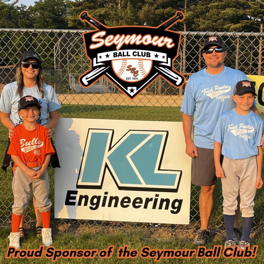 Graphic includes a family of four standing by the "KL" sponsorship sign, as well as the logo for Seymour Ball Club.