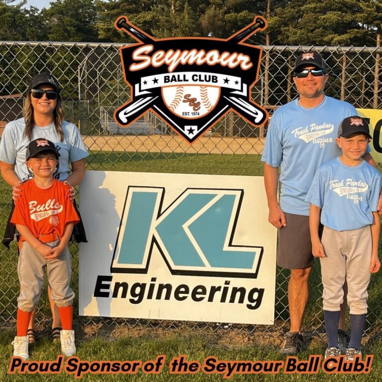 Graphic includes a family of four standing by the "KL" sponsorship sign, as well as the logo for Seymour Ball Club.