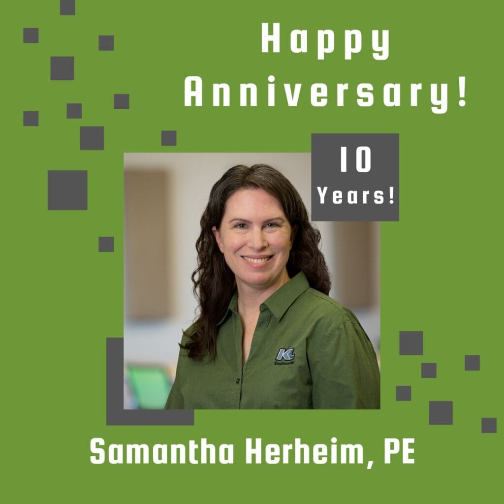 Photo of employee framed by a light green background with gray scattered boxes and Happy Anniversary text.