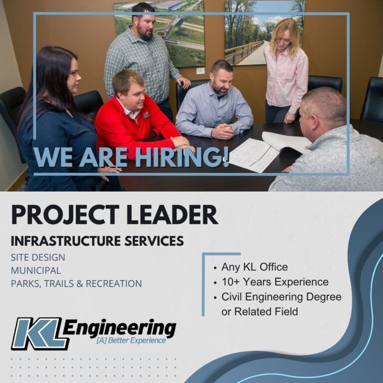 Image of many people in a conference room, meeting and looking at a set of plans. KL logo, job role, location, and details on gray background with blue wave.