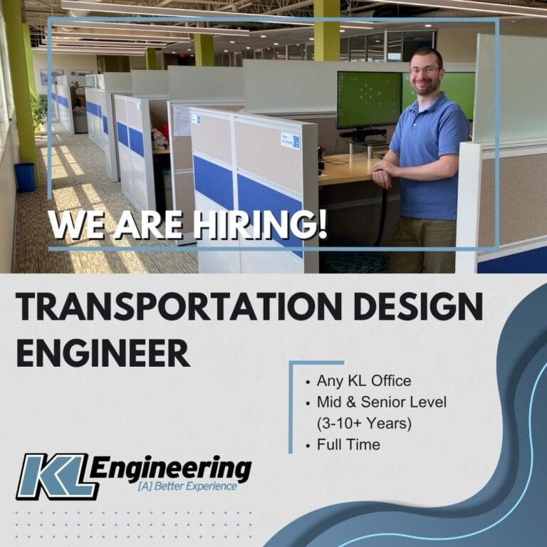 Image of employee standing at his computer smiling at camera in an office setting. KL logo, job role, location, and details on gray background with blue wave.