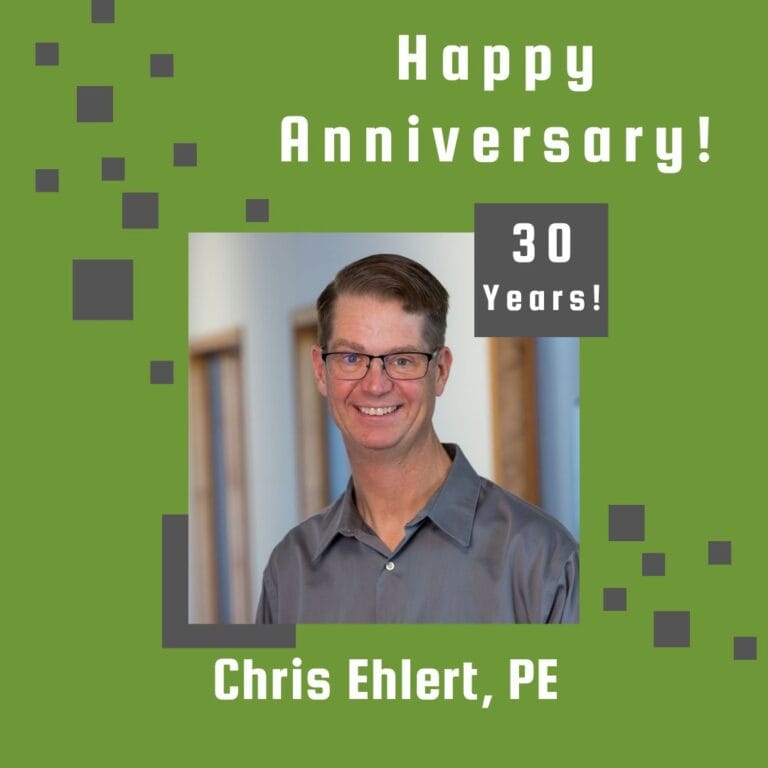 Photo of employee framed by a light green background with gray scattered boxes and Happy Anniversary text.