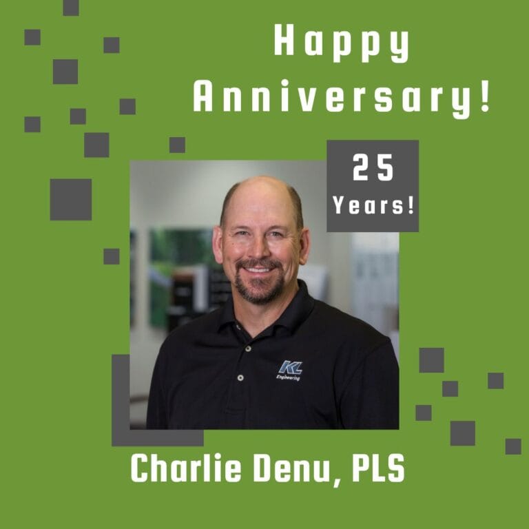 Photo of employee framed by a light green background with gray scattered boxes and Happy Anniversary text.