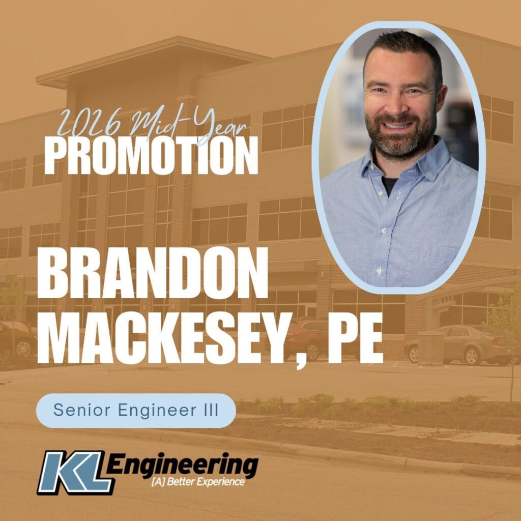 Graphic includes a photo of the employee being celebrated with text that shares the details of the mid year promotion. The background of the graphic is a photo of KL's Madison office, with a light orange filter over it.
