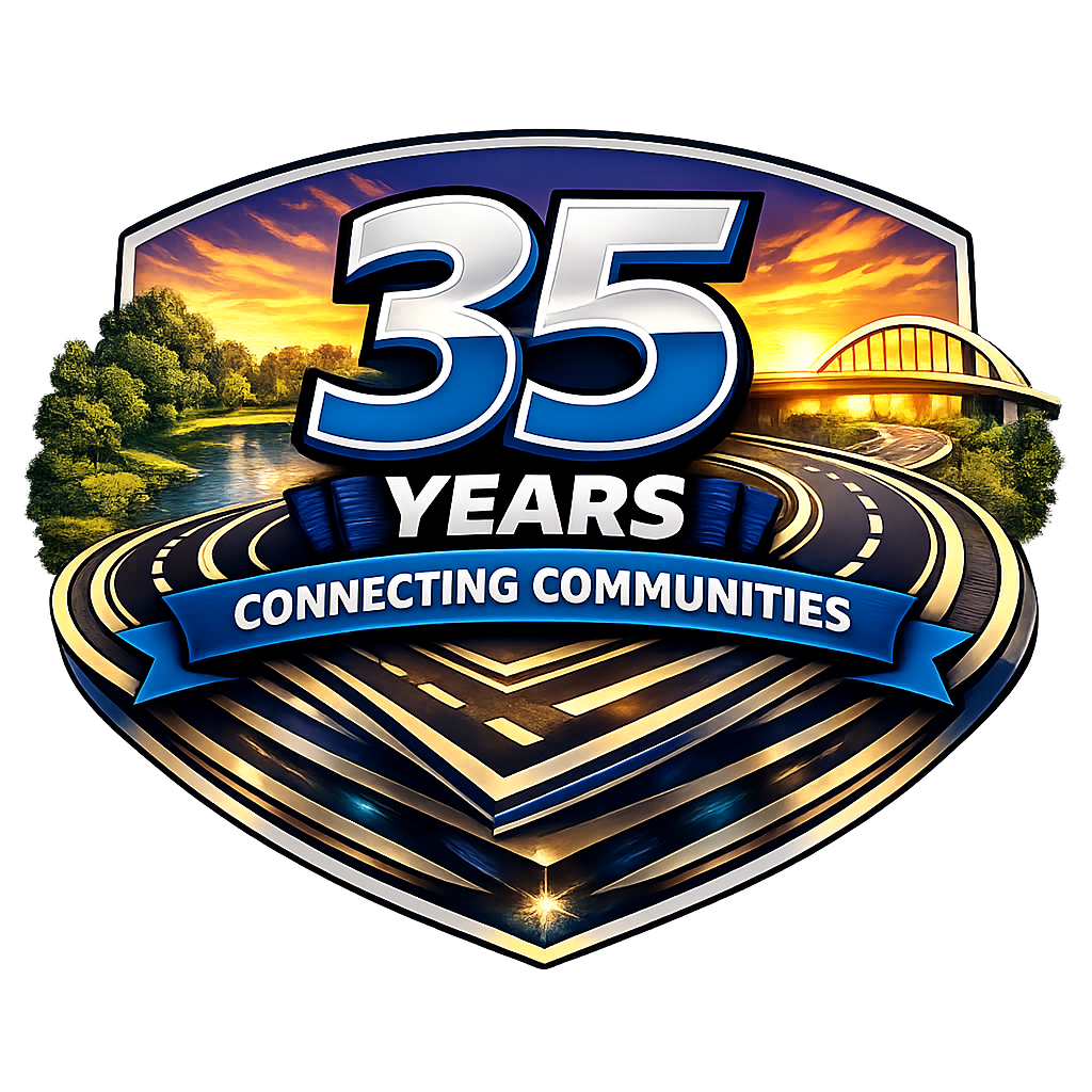 Badge shaped graphic with 35 Years Connecting Communities text with gold lined roadways at the bottom, park like area on the left and bridge on the right.
