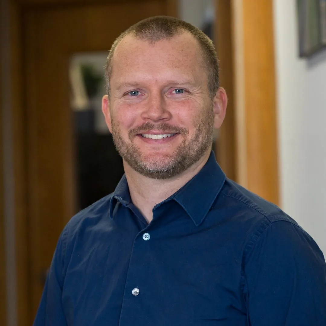 Headshot of Joshua Melby