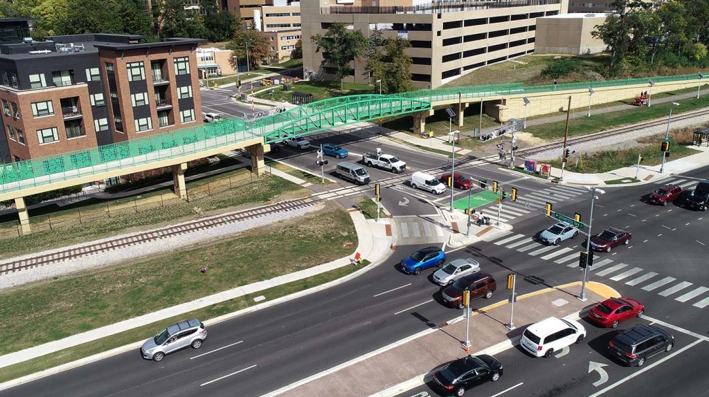 Bridge_Header_1400_DJI_0422 University Avenue and University Bay Drive showing new intersection and bike/ped bridge over University Bay Drive.