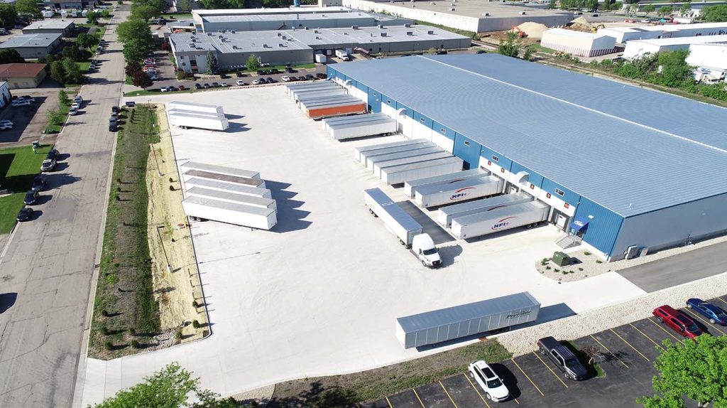 Future Foam_1400_aerial_0519 Future Foam Inc - Aerial view of facility showing semi-trucks, warehouse, and surrounding area.
