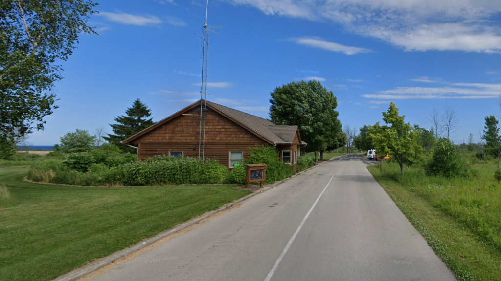 Park Entrance Entrance to the Harrington Beach State Park showing registration building.